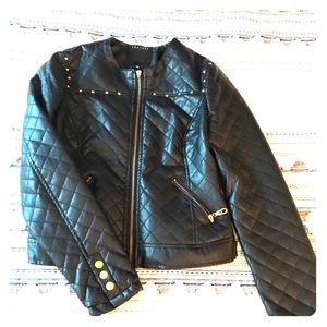 Black faux leather moto jacket with gold studs